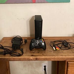 Xbox 360 (used but works well) with controller and cables